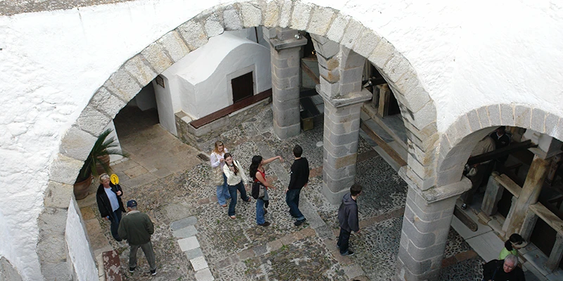 Stone courtyard and arches inside the monastery