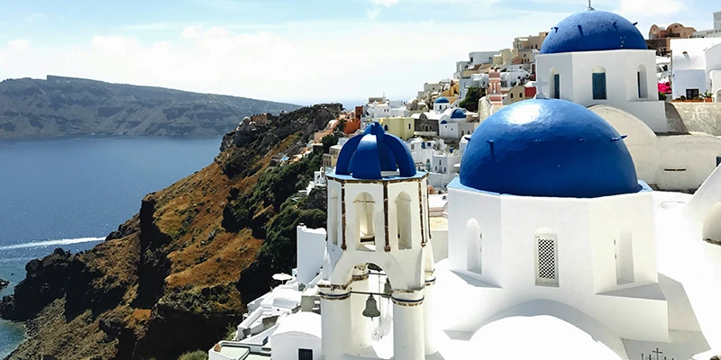 Blue-domed churches of Ia above the sea
