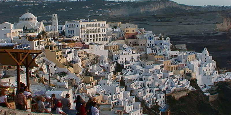 Fira with a blue-domed church above the caldera