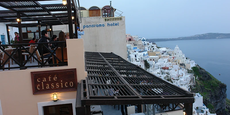 Cafe terrace overlooking the caldera in Fira