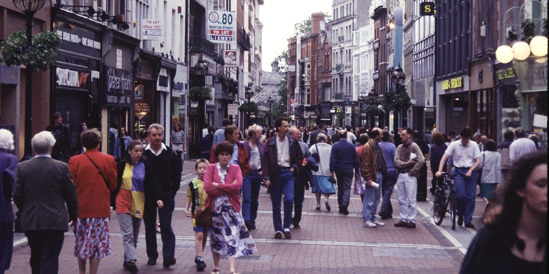 Grafton Street, Dublin, filled with the noontime shopping crowd