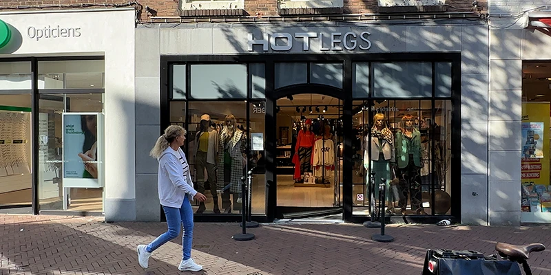 A modern shopfront among the historic streets of central Middelburg
