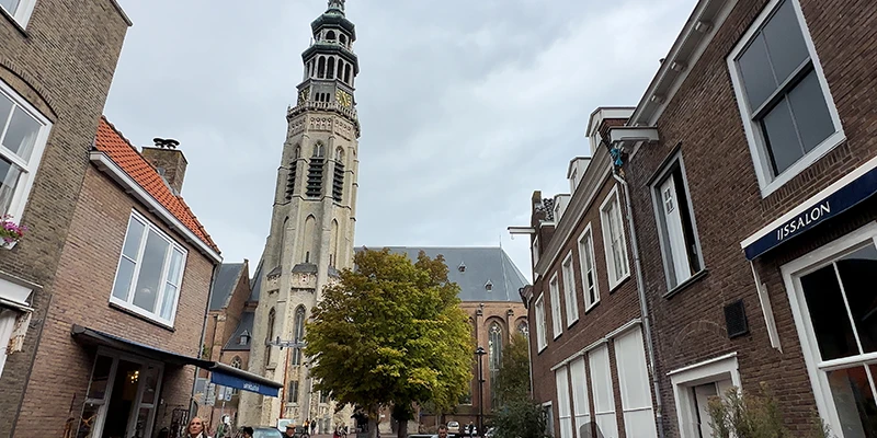 The octagonal Lange Jan abbey tower seen from a Middelburg lane